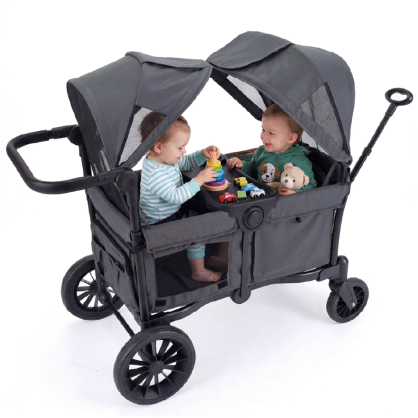babies playing in the deluxe stroller wagon